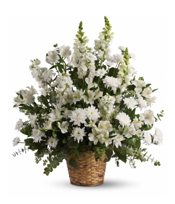 White flower arrangement in basket