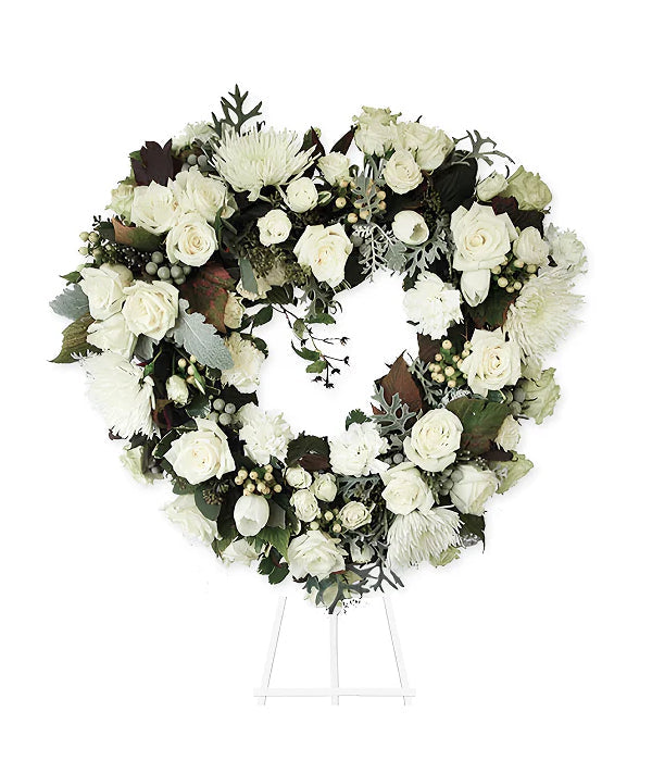 PurestHeart floral heart wreath with white flowers.