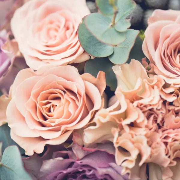 Wedding bouquet with pink roses and carnations