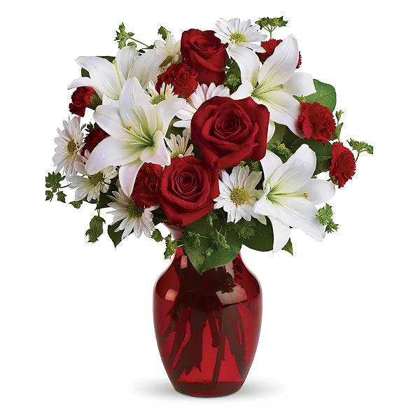 red and white flowers in a vase